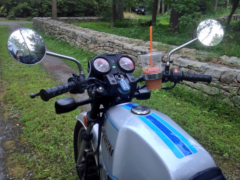 Illustration for article titled I Put A Cupholder On My Motorcycle And I Regret Nothing